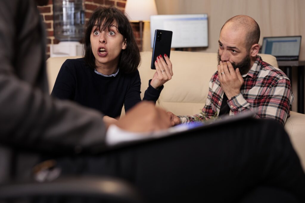 Angry wife accusing husband of cheating and marriage betrayal