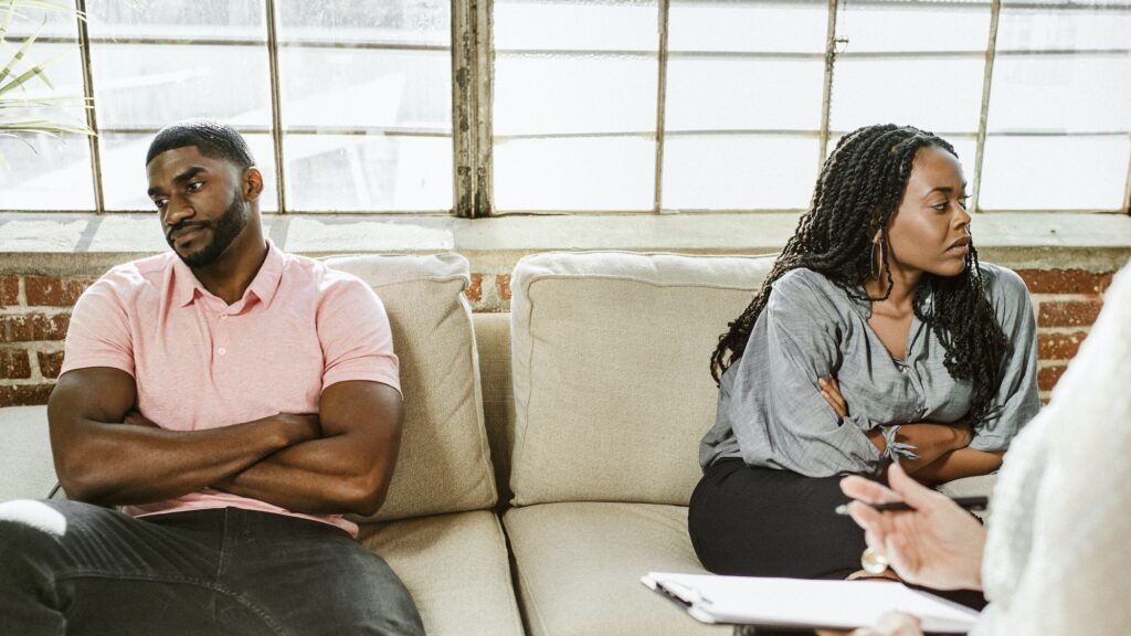 Black couple having a marriage counseling with therapist